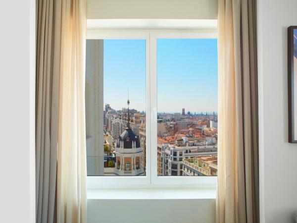 Riu Plaza España : photo 1 de la chambre chambre lit king-size deluxe avec vue