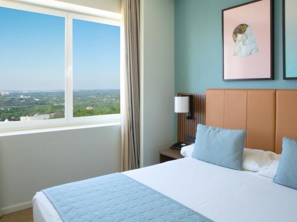 Riu Plaza España : photo 1 de la chambre chambre lit king-size supérieure deluxe avec vue