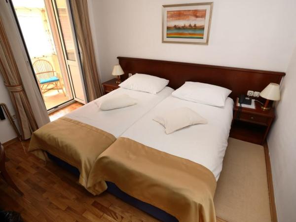 Heritage Hotel Vila Sikaa : photo 4 de la chambre chambre lits jumeaux avec balcon