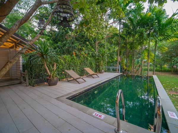 Baan Suan Residence เฮือนพักบ้านสวน : photo 2 de la chambre villa familiale avec piscine privée