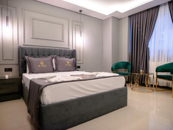 ZaraSuit : photo 3 de la chambre chambre double avec lit d'appoint