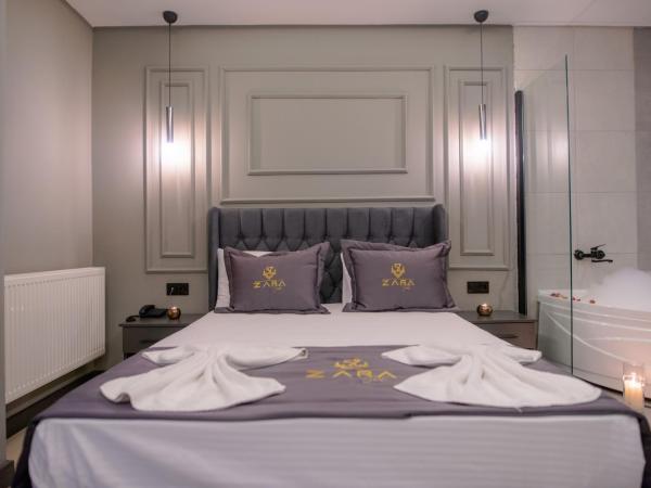 ZaraSuit : photo 2 de la chambre chambre double avec lit d'appoint