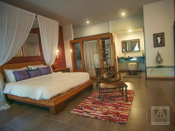 Baan Suan Residence เฮือนพักบ้านสวน : photo 2 de la chambre studio avec vue sur jardin