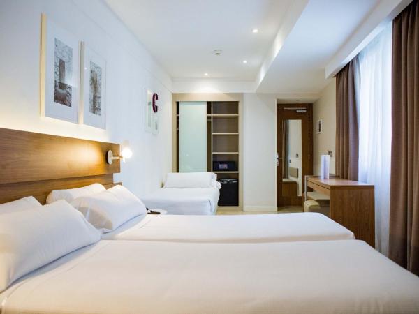 Hotel Gelmírez : photo 1 de la chambre chambre triple