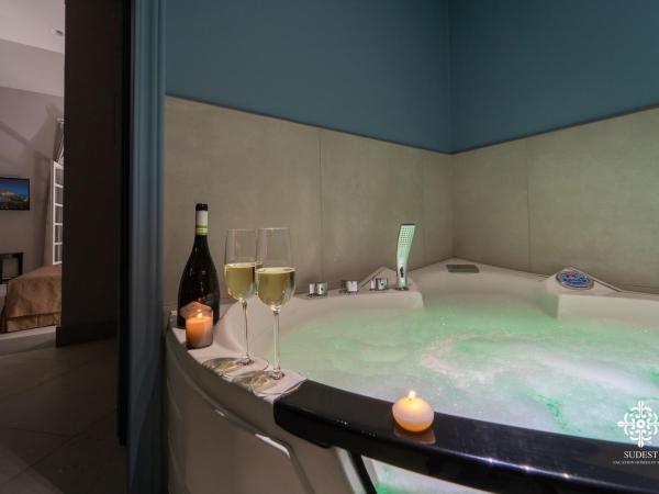 Matteotti Luxury Residence : photo 7 de la chambre appartement supérieur avec jacuzzi