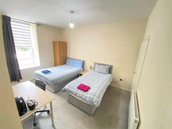 IBROX GuestHouse : photo 2 de la chambre chambre lits jumeaux Économique