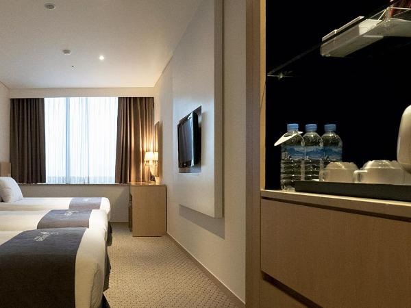 Hotel Venue-G Seoul : photo 4 de la chambre chambre triple de luxe avec baignoire