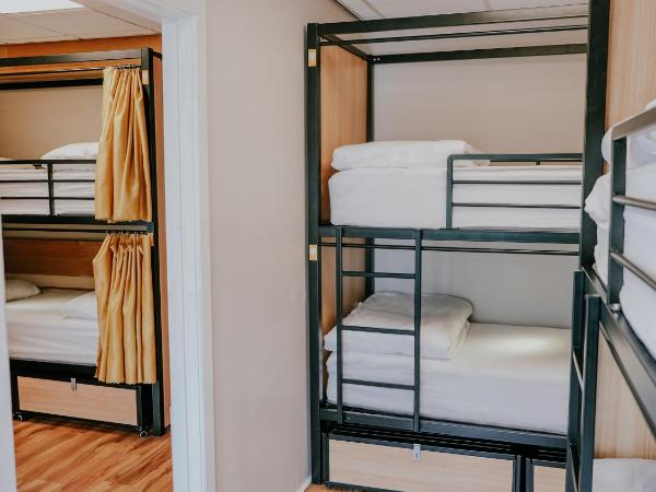 Canbe Garden Lane Backpackers : photo 1 de la chambre lit dans dortoir mixte de 8 lits avec salle de bains commune