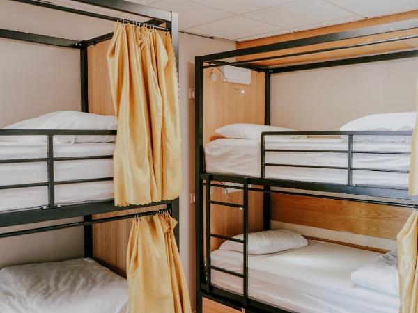 Canbe Garden Lane Backpackers : photo 1 de la chambre lit dans dortoir mixte de 4 lits avec salle de bains commune