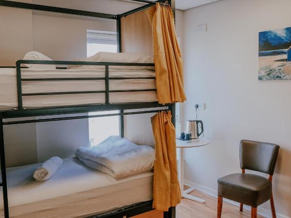 Canbe Garden Lane Backpackers : photo 1 de la chambre chambre lits jumeaux standard avec salle de bains commune