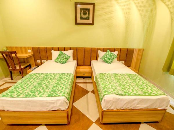 Gems Suites-A Boutique Stay : photo 6 de la chambre chambre lits jumeaux avec balcon