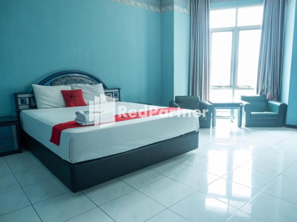 Akur Hotel Malioboro Mitra RedDoorz : photo 2 de la chambre suite