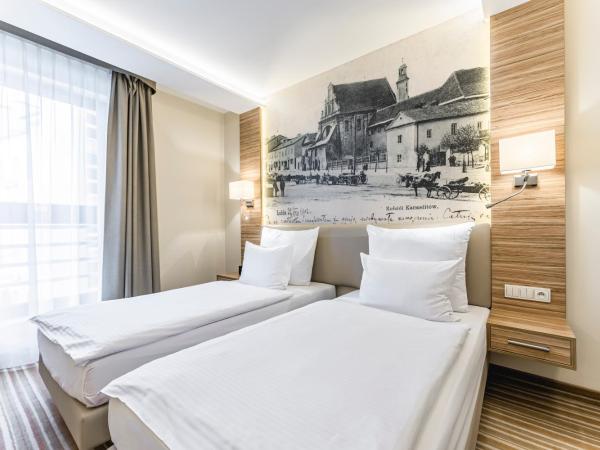 Hotel Wieniawski : photo 1 de la chambre chambre lits jumeaux confort