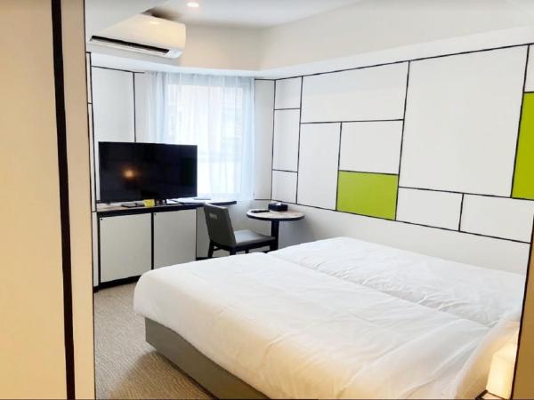 Henn na Hotel Osaka Shinsaibashi : photo 1 de la chambre chambre lits jumeaux hollywood