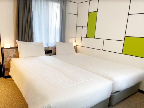 Henn na Hotel Osaka Shinsaibashi : photo 10 de la chambre chambre lits jumeaux hollywood