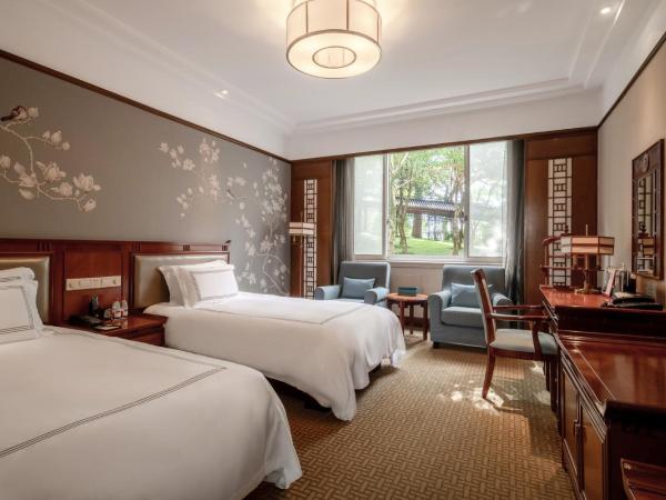 West Lake State Guest House : photo 1 de la chambre chambre lits jumeaux - vue sur cour