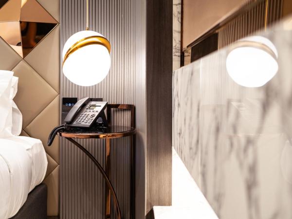 The One Smart Living : photo 5 de la chambre chambre deluxe double ou lits jumeaux