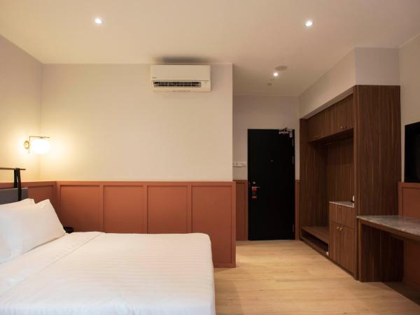 Monocolo Boutique Hotel : photo 5 de la chambre chambre triple deluxe