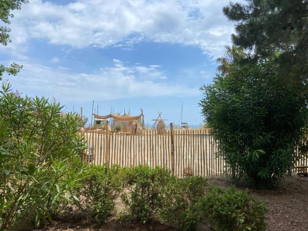 Les Lodges de la Plage U Dragulinu : photo 8 de la chambre chambre quadruple - vue sur mer