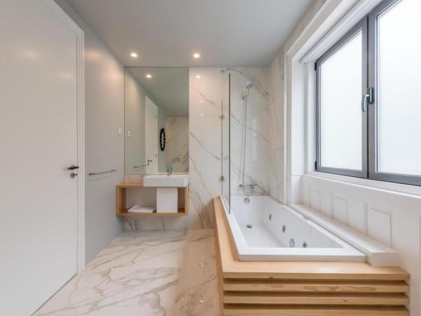 Serenata Boutique Rooms : photo 1 de la chambre suite deluxe avec baignoire spa