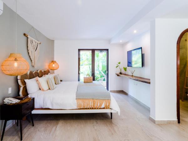 Ana y Jose Hotel & Beach Club Tulum : photo 3 de la chambre suite - vue sur jardin