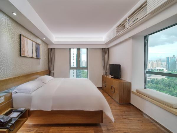 Fietser International Residence : photo 2 de la chambre warm city-view two-bedroom apartment