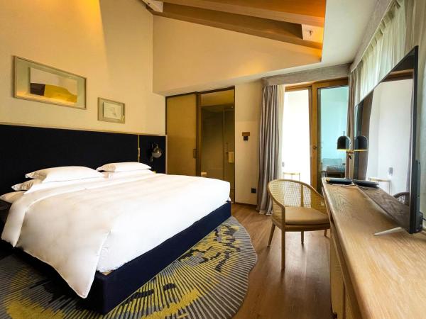 voco Nanjing Garden Expo, an IHG Hotel : photo 2 de la chambre chambre lit king-size standard avec vue sur cour