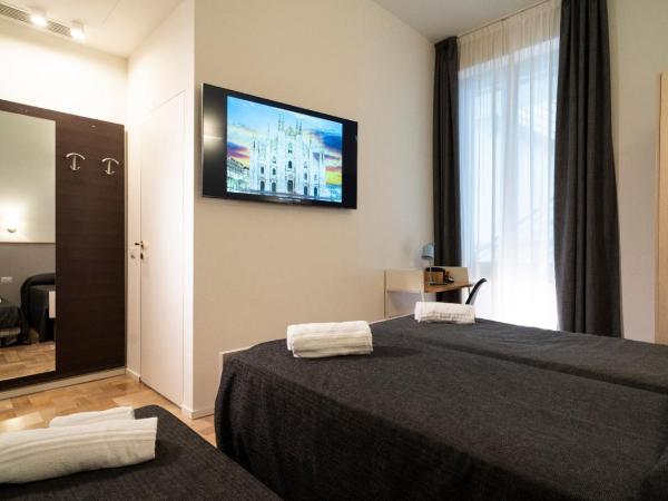 Villino Milano : photo 3 de la chambre chambre triple