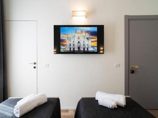 Villino Milano : photo 9 de la chambre chambre lits jumeaux