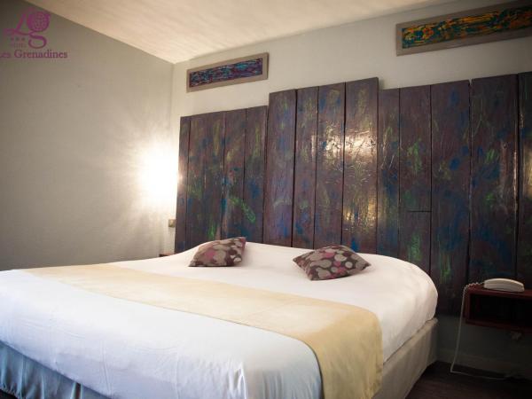 Hotel Les Grenadines : photo 1 de la chambre chambre familiale (2 adultes et 2 enfants)
