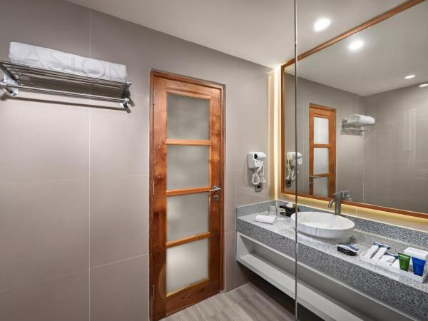 Aston Inn Jemursari : photo 4 de la chambre hébergement deluxe