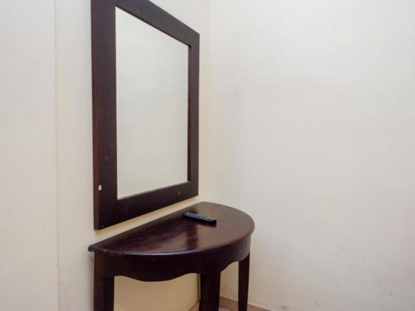 RedDoorz At Hotel Sartika Yogyakarta : photo 1 de la chambre chambre lits jumeaux