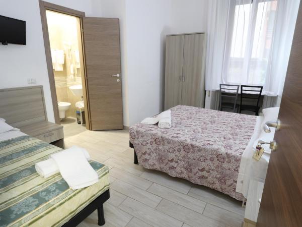 Albergo Leonardo Da Vinci : photo 1 de la chambre chambre triple