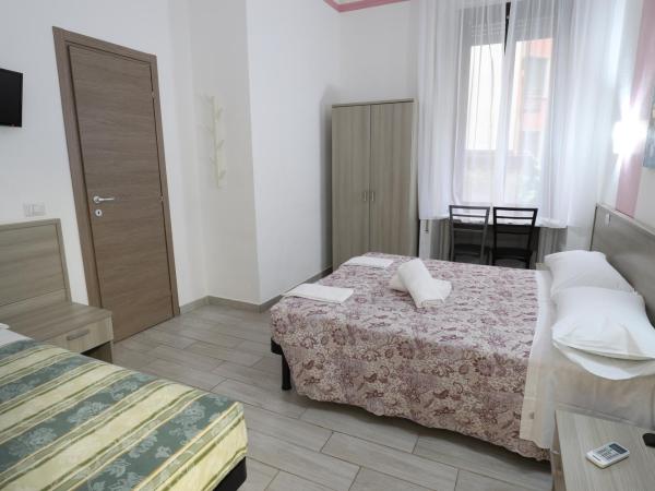 Albergo Leonardo Da Vinci : photo 2 de la chambre chambre triple