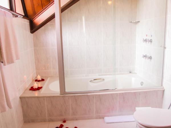 Johnscher by SJ - San Juan Curitiba : photo 6 de la chambre suite lit king-size