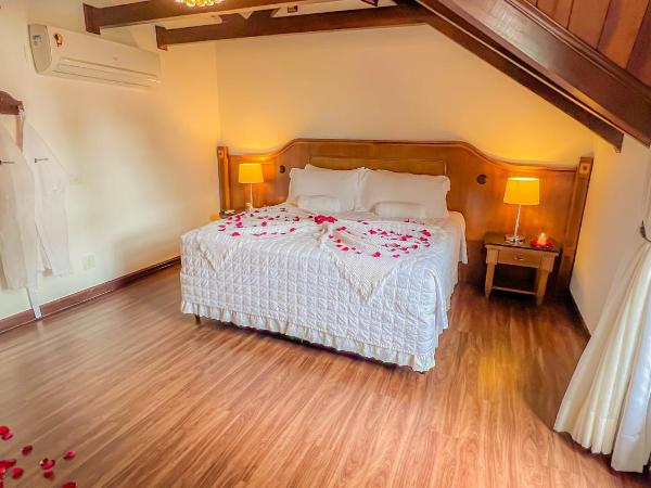 Johnscher by SJ - San Juan Curitiba : photo 7 de la chambre suite lit king-size