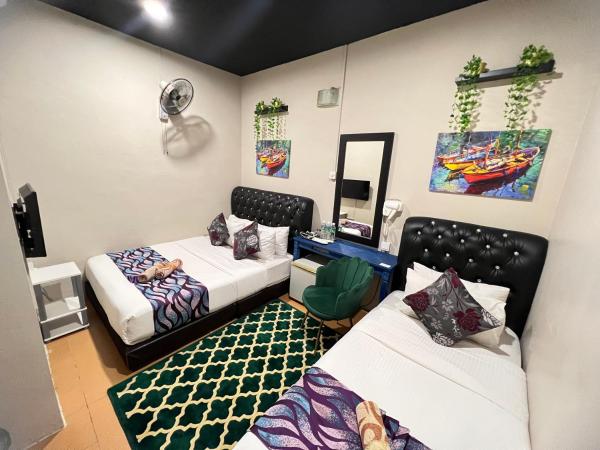 Ghazrins Garuda JB : photo 2 de la chambre chambre familiale standard