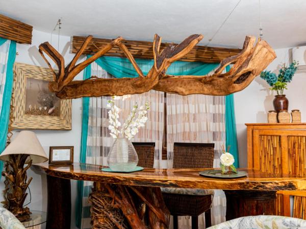Monyoli Hotel & Boutique : photo 7 de la chambre suite lit king-size avec baignoire spa