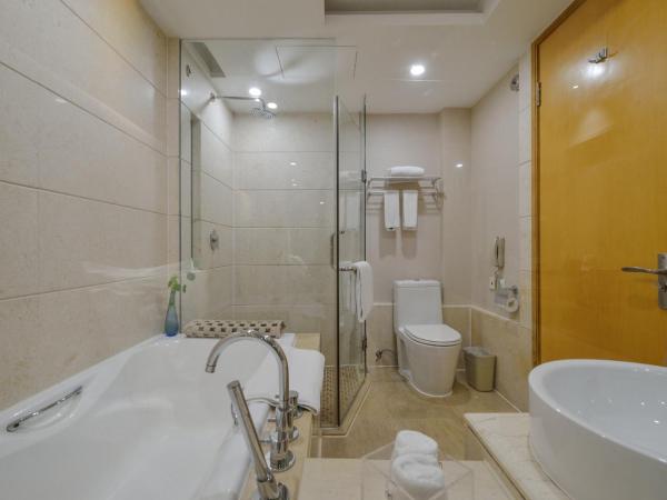 Bayshore Hotel Dalian : photo 3 de la chambre chambre lits jumeaux supérieure - vue sur jardin