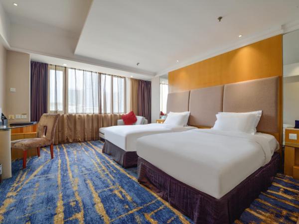 Bayshore Hotel Dalian : photo 1 de la chambre chambre lits jumeaux supérieure - vue sur jardin