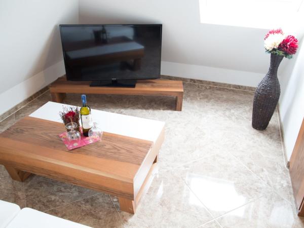 Alpha & Omega Hotel : photo 3 de la chambre suite deluxe avec baignoire spa