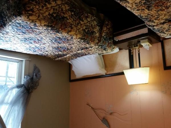 A Voyageur's Guest House : photo 10 de la chambre chambre double avec 2 lits doubles et salle de bains privative