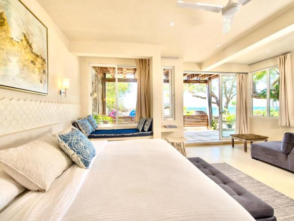 Casa Coco by Coco B Isla : photo 5 de la chambre suite lit king-size - vue partielle sur océan