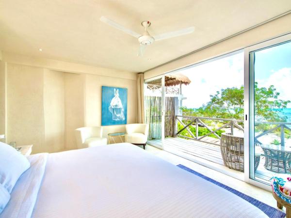 Casa Coco by Coco B Isla : photo 3 de la chambre suite deluxe - vue sur mer