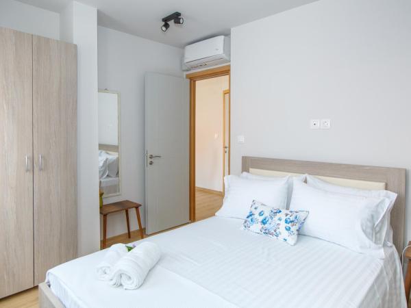 ΟNIRO Comfort Living : photo 8 de la chambre chambre quadruple avec salle de bains privative