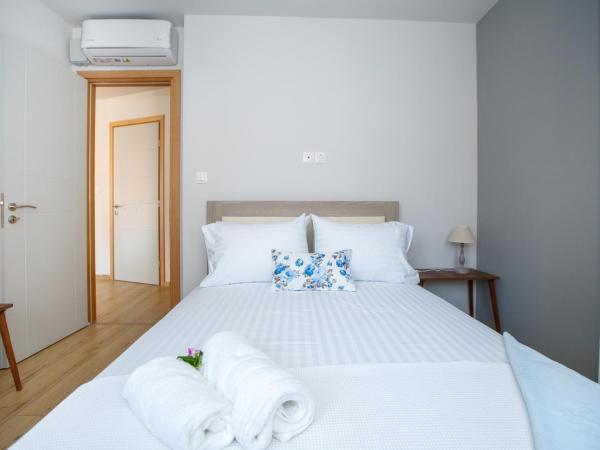 ΟNIRO Comfort Living : photo 6 de la chambre chambre quadruple avec salle de bains privative