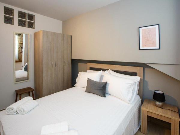 ΟNIRO Comfort Living : photo 6 de la chambre chambre quadruple avec salle de bains privative