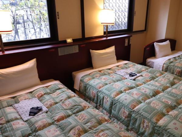 Tokyo Inn : photo 3 de la chambre chambre lits jumeaux - fumeurs