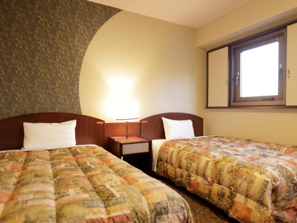 Tokyo Inn : photo 5 de la chambre chambre lits jumeaux - non-fumeurs