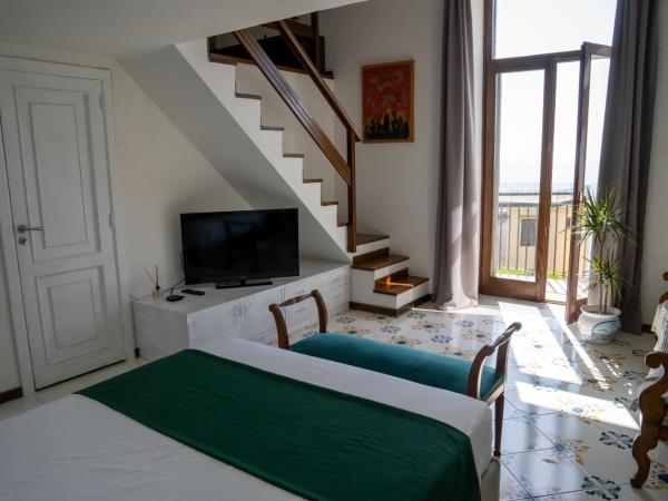 Le Stanze di Sissi - Luxury Suites : photo 5 de la chambre chambre double deluxe - vue sur mer